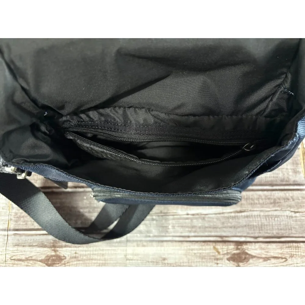 Tumi Fremont KERBY 9.5” Sling Crossbody Bag color NAVY BLUE NWT mspr $295